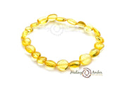 7.5" Amber bracelet- Shiny Liquid gold oval (stretch)